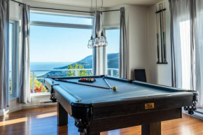 Chalet panoramique (unité du bas) : Spa, vue et Massif